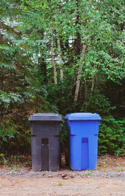 Clean residential trash and recycling bins after cleaning