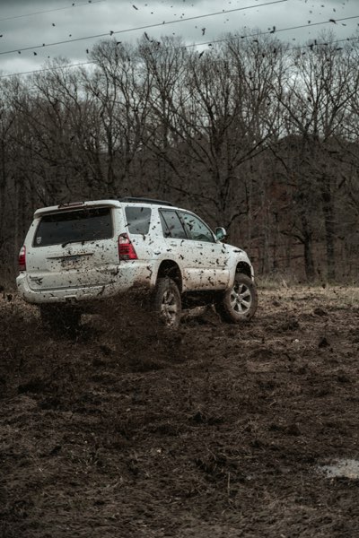 Mud-covered vehicle before washing